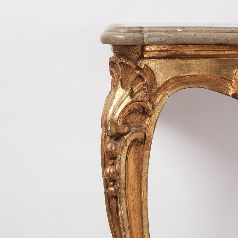 A Swedish giltwood and limestone console table, Stockholm, later part 18th century.