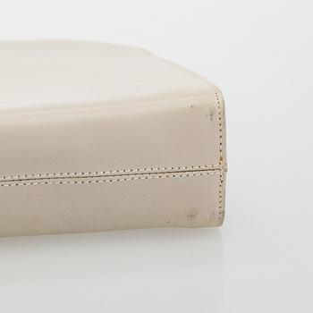 Salvatore Ferragamo, a leather “Gancini”bag.