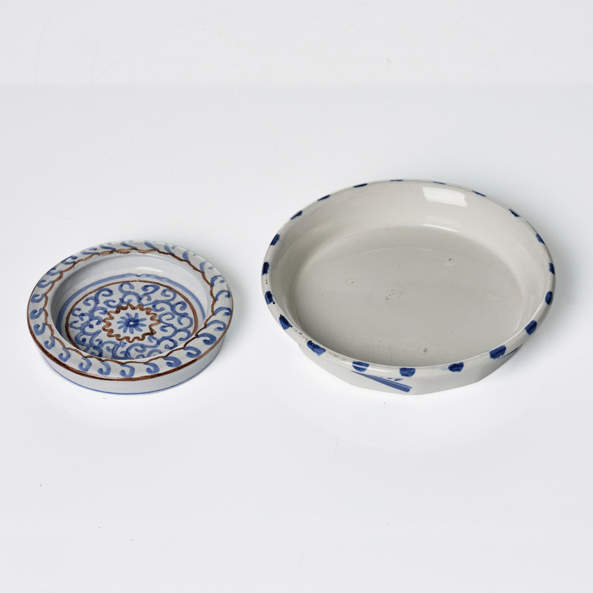 Wilhelm Kåge, eleven pieces of faience including jars, inkwells and a tulip vase, Gustavsberg, Sweden, 1919-1920.