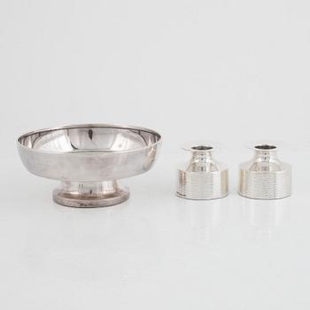 A pair of Swedish silver candlesticks and a bowl, including Eric Löfman, KG Markströms, Uppsala 1973.