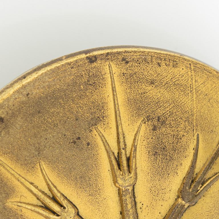 René Lalique, a brooch, glass, with a motif of crickets.