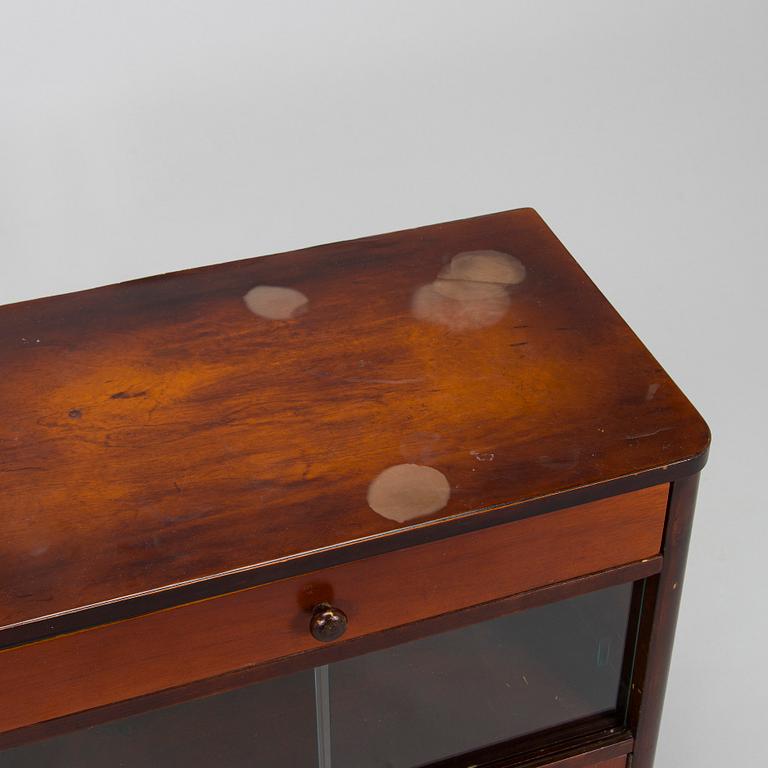 A 1930s functionalist style chest of drawers.