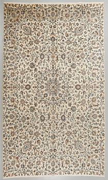 A Keshan rug, 396 x 290 cm.