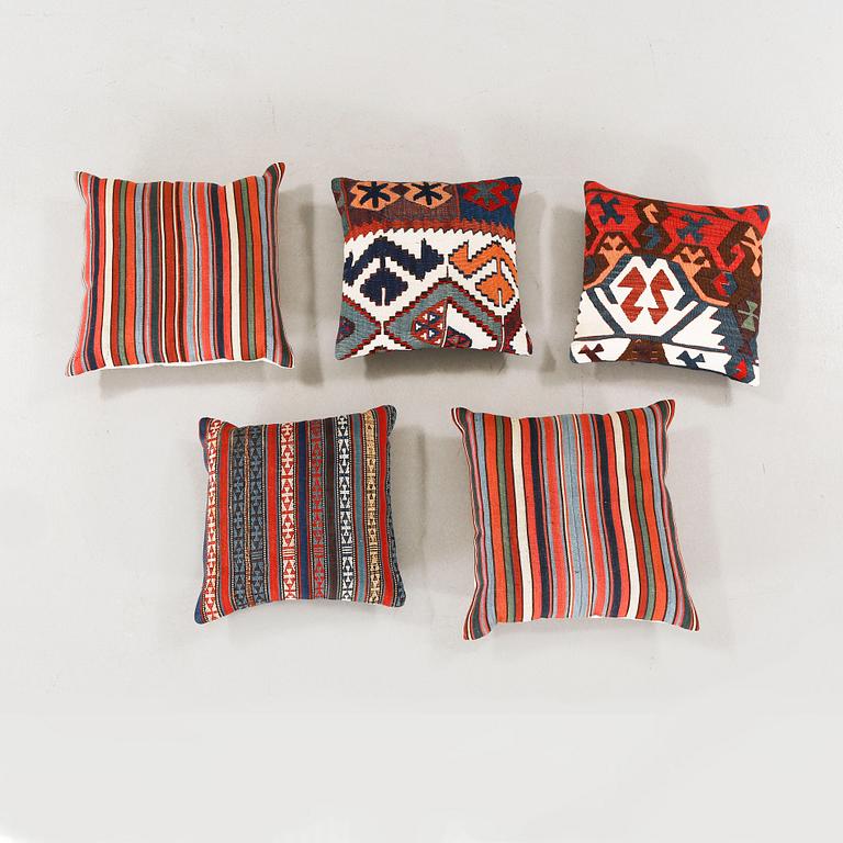 Five kelim pillows.