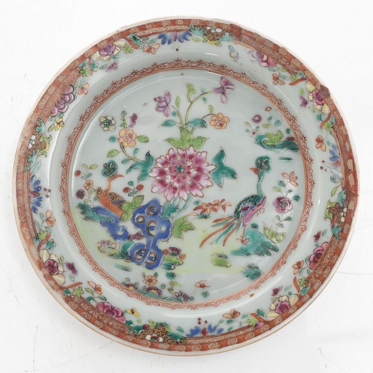 A small Chinese famille rose porcelain tureen with cover and stand, two salt cellars, Qing dynasty, Qianlong (1736-95).