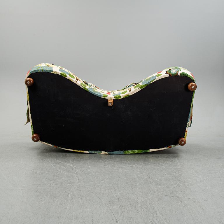 A model 968 sofa by Josef Frank for Firma Svenskt Tenn.