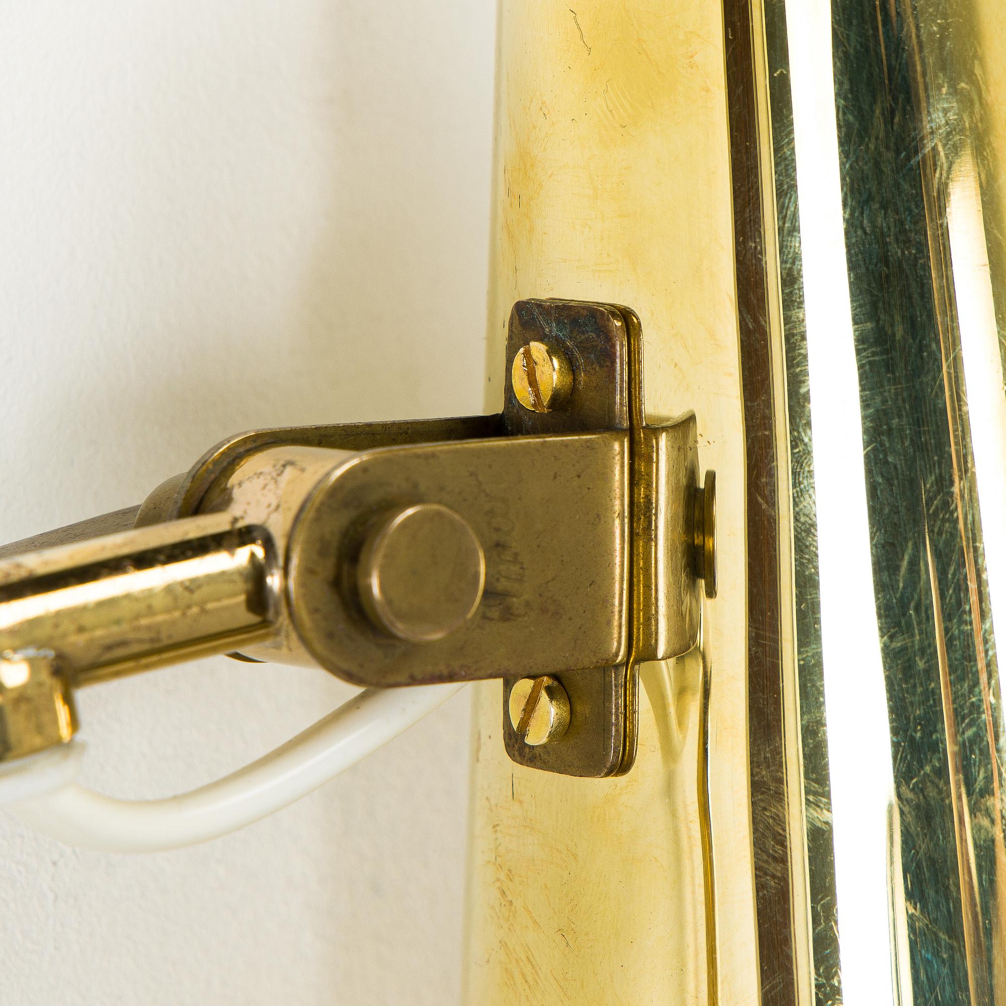 Paavo Tynell, a brass wall light model 9459, Idman, Finland 1960s.