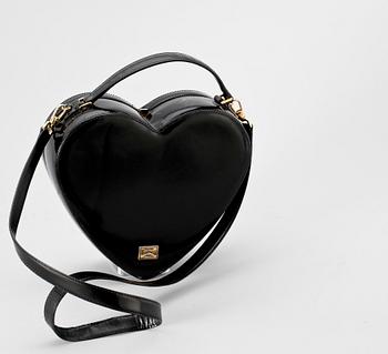 1461. A black lacquer handbag by Moschino.