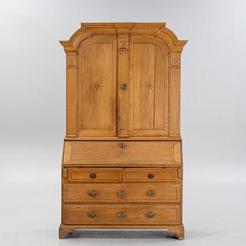 A late Baroque writing cupboard, mid 18th century. Possably Småland, Sweden.