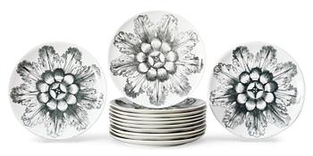 499. A set of twelve Piero Fornasetti 'Rosoni' porcelain plates, Milan, Italy.