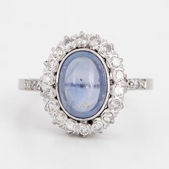 Cabochon-cut sapphire and eight-cut diamond ring.