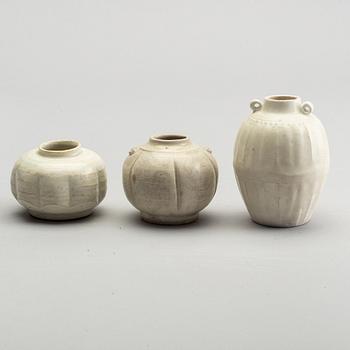 A group of white glazed South East Asian vases and bowls, partly 16/17th Century.