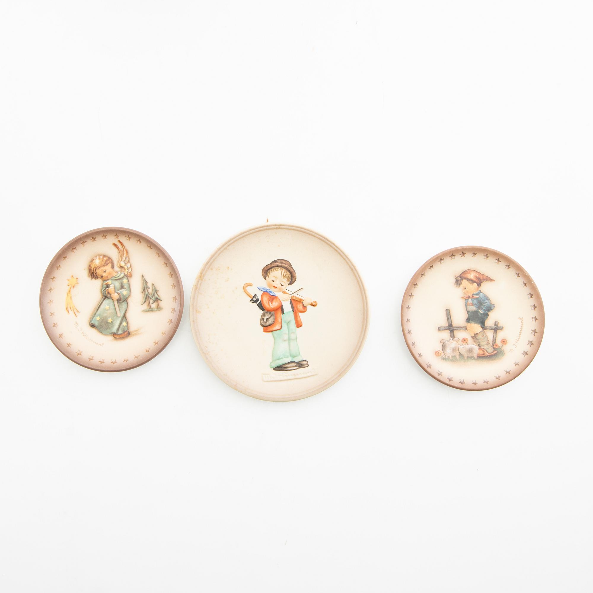 Figurines 17 pcs and plates 3 pcs Goebel MJ Hummel Germany mid-20th century porcelain.