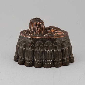 A 19th century pewter and copper mould.