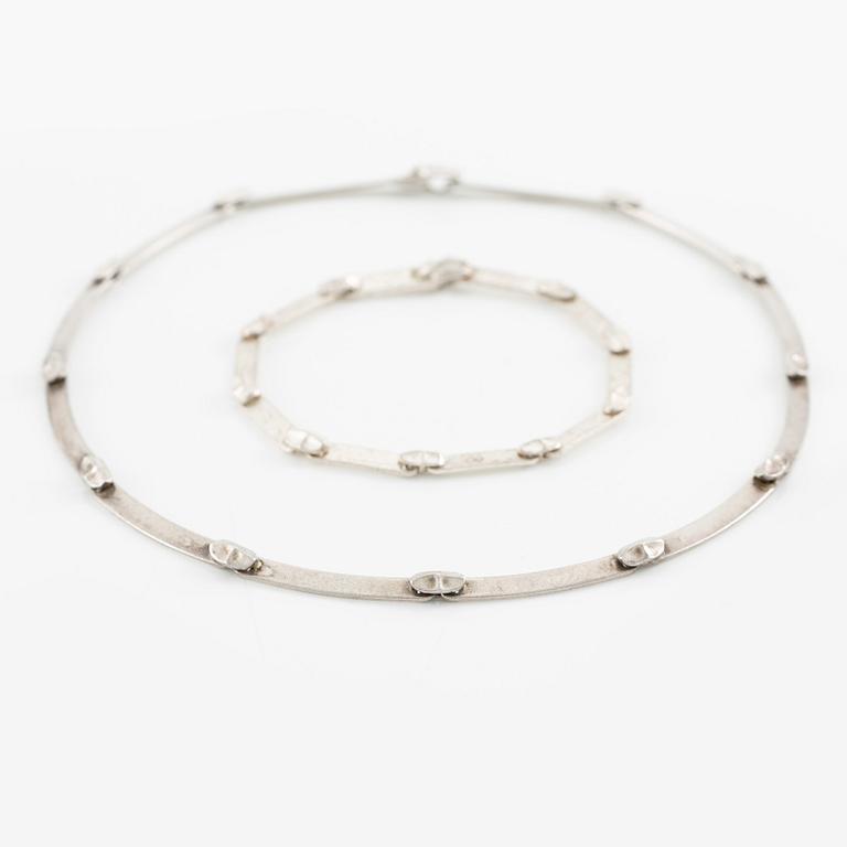 Lapponia a necklace, a pair of earrings and a brooch, sterling silver.