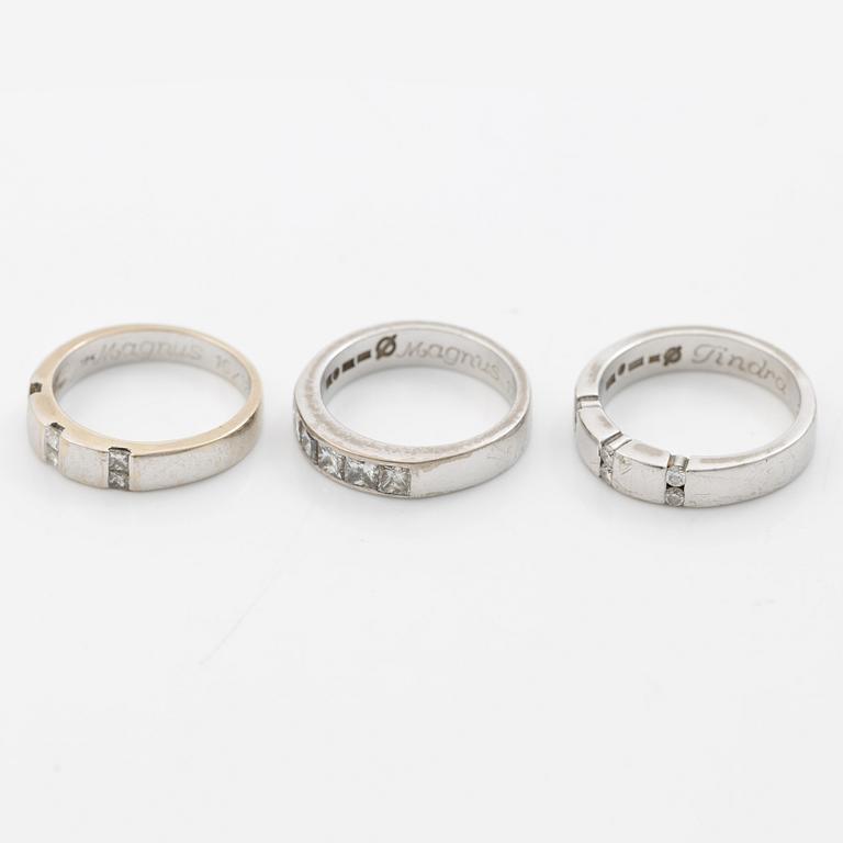 Three rings, 18K white gold with brilliant-cut and princess-cut diamonds.