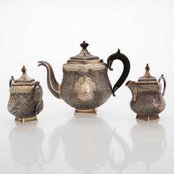 A three-piece silver parcel-gilt tea set, Finnish import marks 1967.