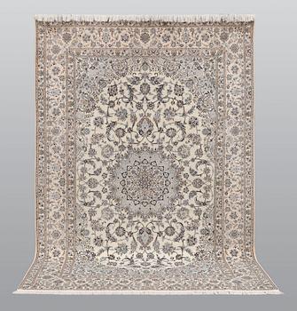 A carpet, Nain part silk s.k 6LAA, ca 310 X 209 cm.