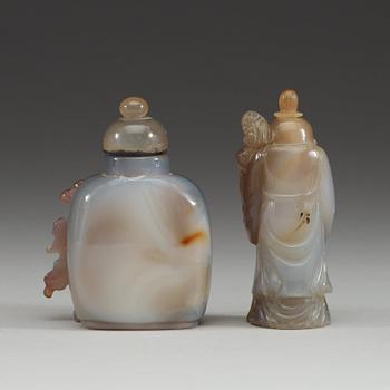 Two Chinese agate snuff bottles with stoppers.