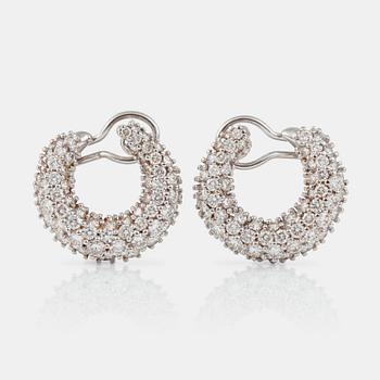 A pair of diamond, circa 6.00 cts in total, earrings. Signed Garrard.