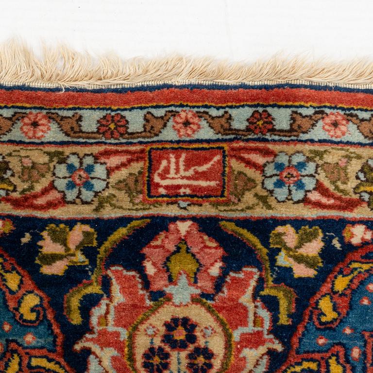 A carpet, semi-antique, Tabriz, signed Seylabi, ca 355 x 278 cm.