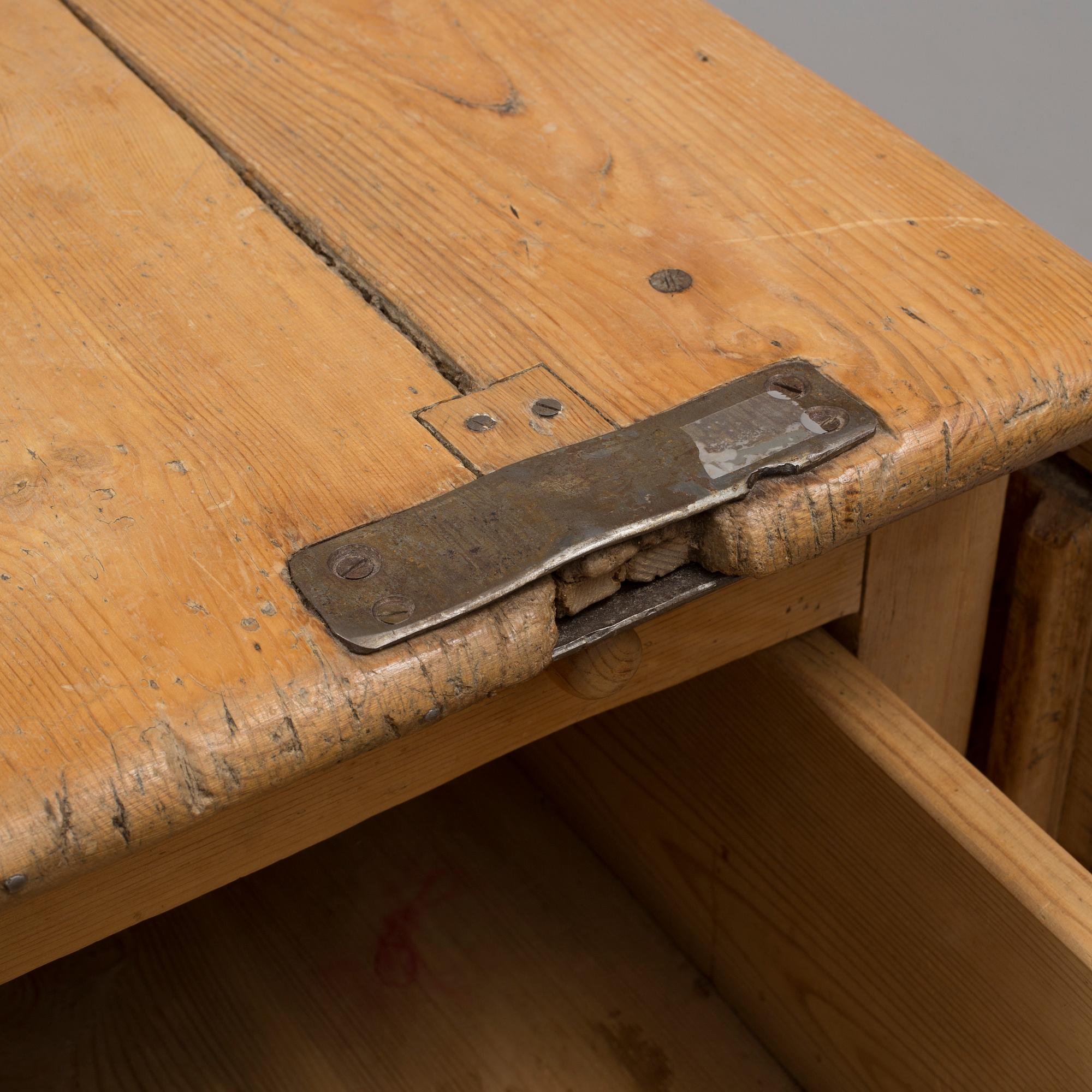 A 19th century pine flap table.
