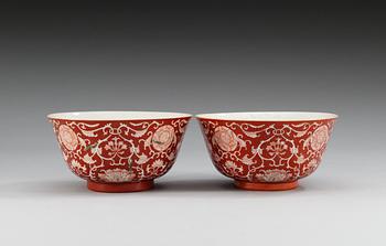 Two reserved-decorated coral-ground bowls, Qing dynasty with Daoguang´s seal mark and of the period (1821-50).