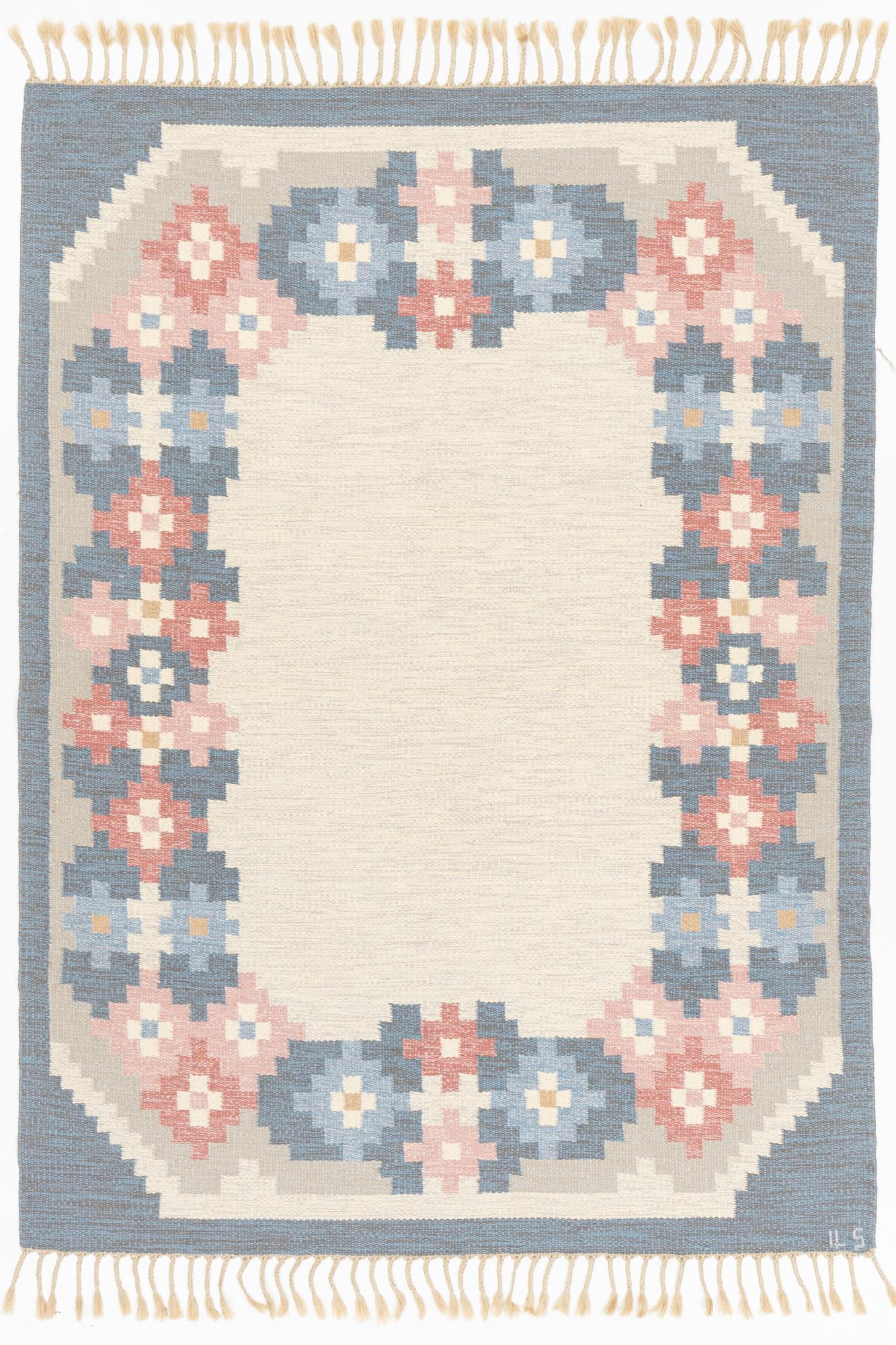 A flat weave carpet, signed  ILS, Alestalon Mattokutomo, Kauhava, Finland, c.  230 x 158 cm.