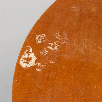 A 1940s mahogany veneer table.