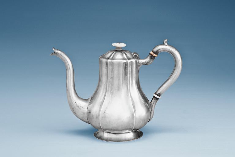 A COFFEE POT.