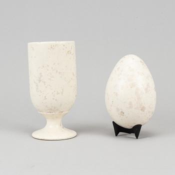 Hans Hedberg, a faience sculpture of an egg and a vase / egg cup, Biot, France.