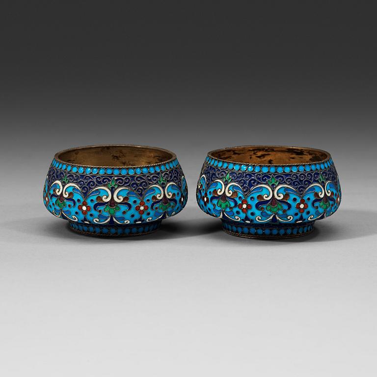 A pair of Russian early 20th century silver-gilt and enamel salts, unidentified makers mark, Moscow 1899-1908.