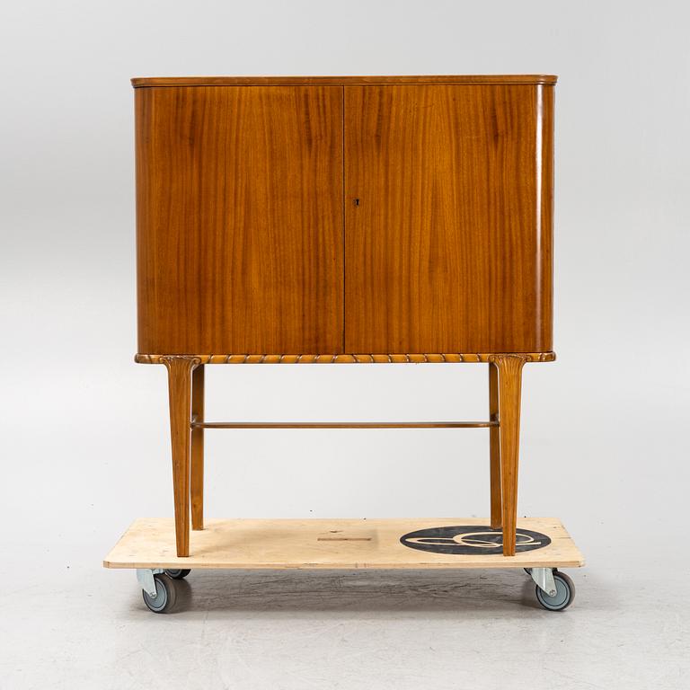 A Swedish Modern mahogany-veneered bar cabinet, 1940's/50's.