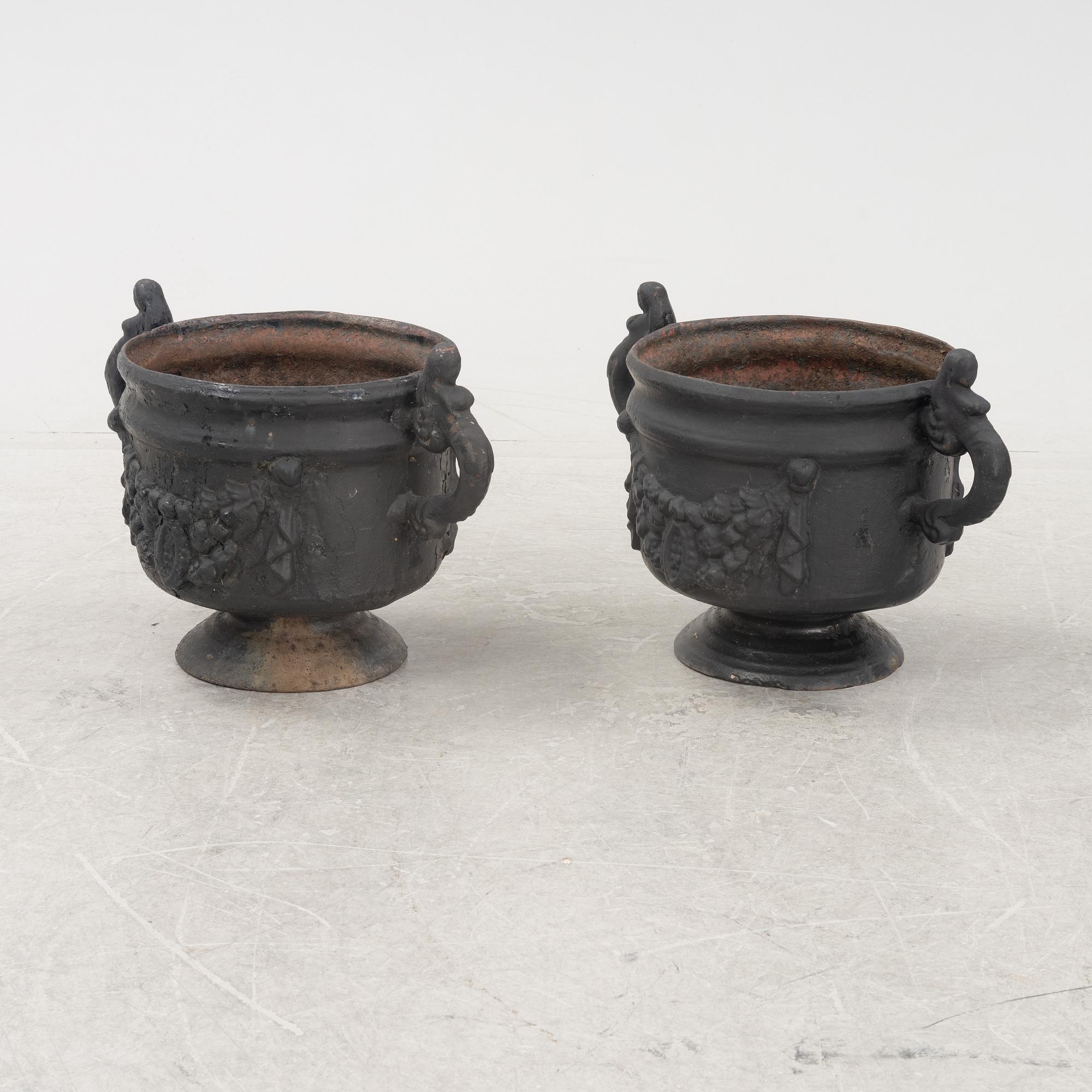 A pair of cast-iron urns from Stafsjö Bruk, 20th Century.