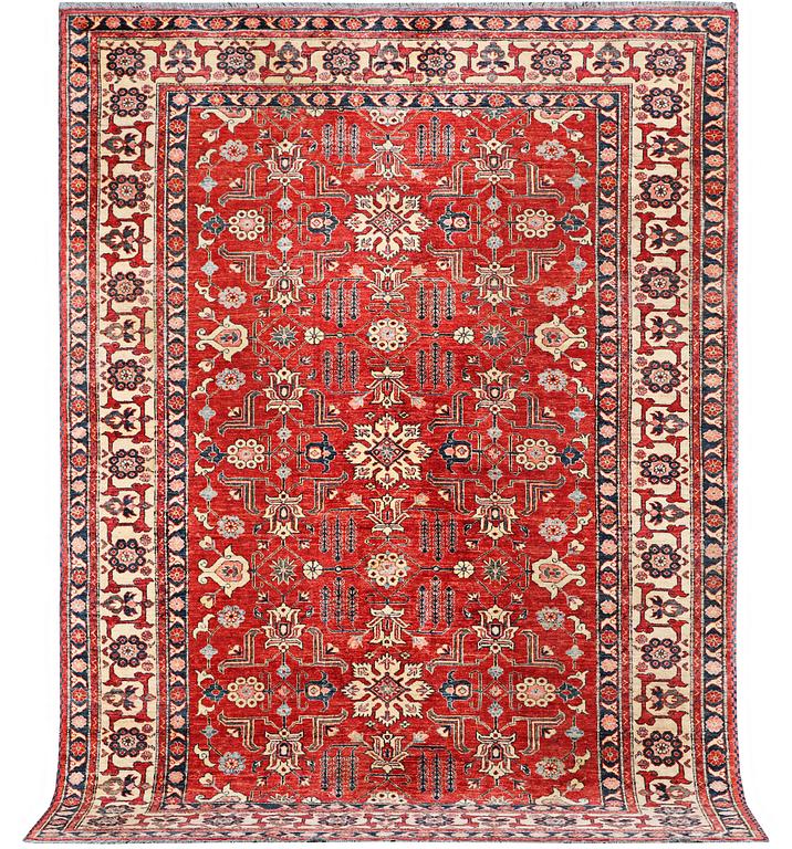 A Kazak carpet, c. 325 x 240 cm.