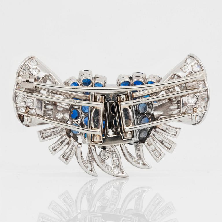 A diamond and sapphire set, probably Garrard & co. The set can be worn as a necklace, earrings, double clip or brooch.