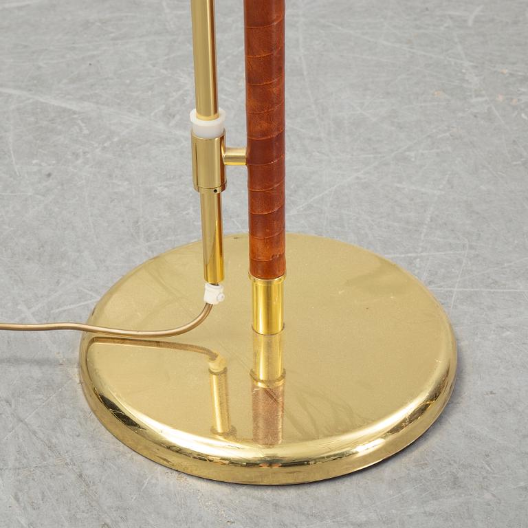 A pair of brass and leather floor lights, Örsjö Industri, 21st century.