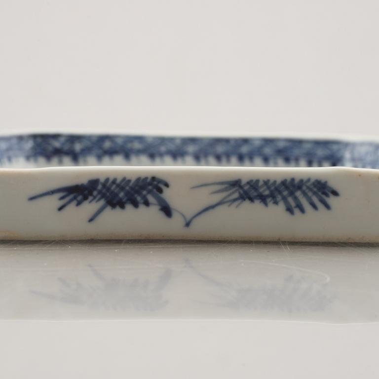 A nine piece Chinese porcelain cabaret in its original lacquer box, Qing dynasty, Qianlong (1736-95).
