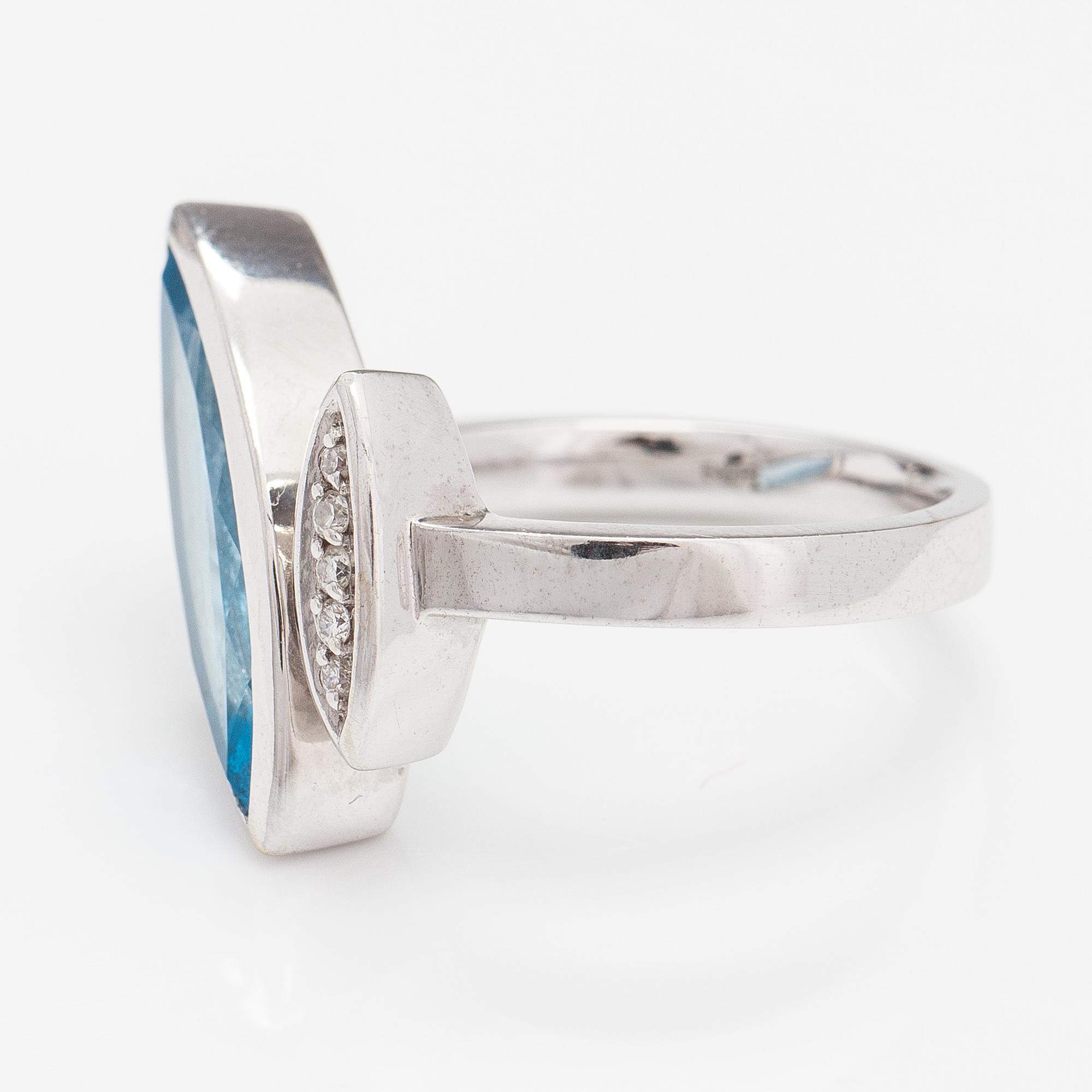 RING, 14K vitguld, topas, diamanter ca 0.05 ct tot.