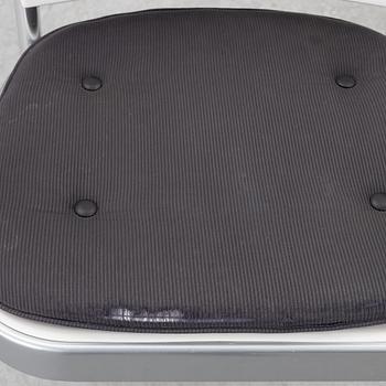 Vico Magistretti, a "Shine" dining table with twelve chairs, De Padova, Italy, around the year 2000.