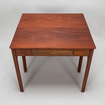 An 19th century game table England.