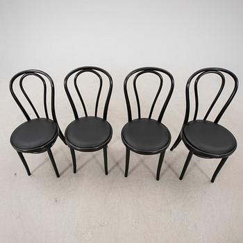 A swt of four painted chairs later part of the 20th century.
