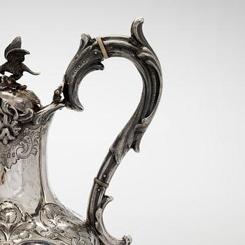 A sterling silver jug, maker's mark of Martin, Hall & Co, Sheffield 1877.