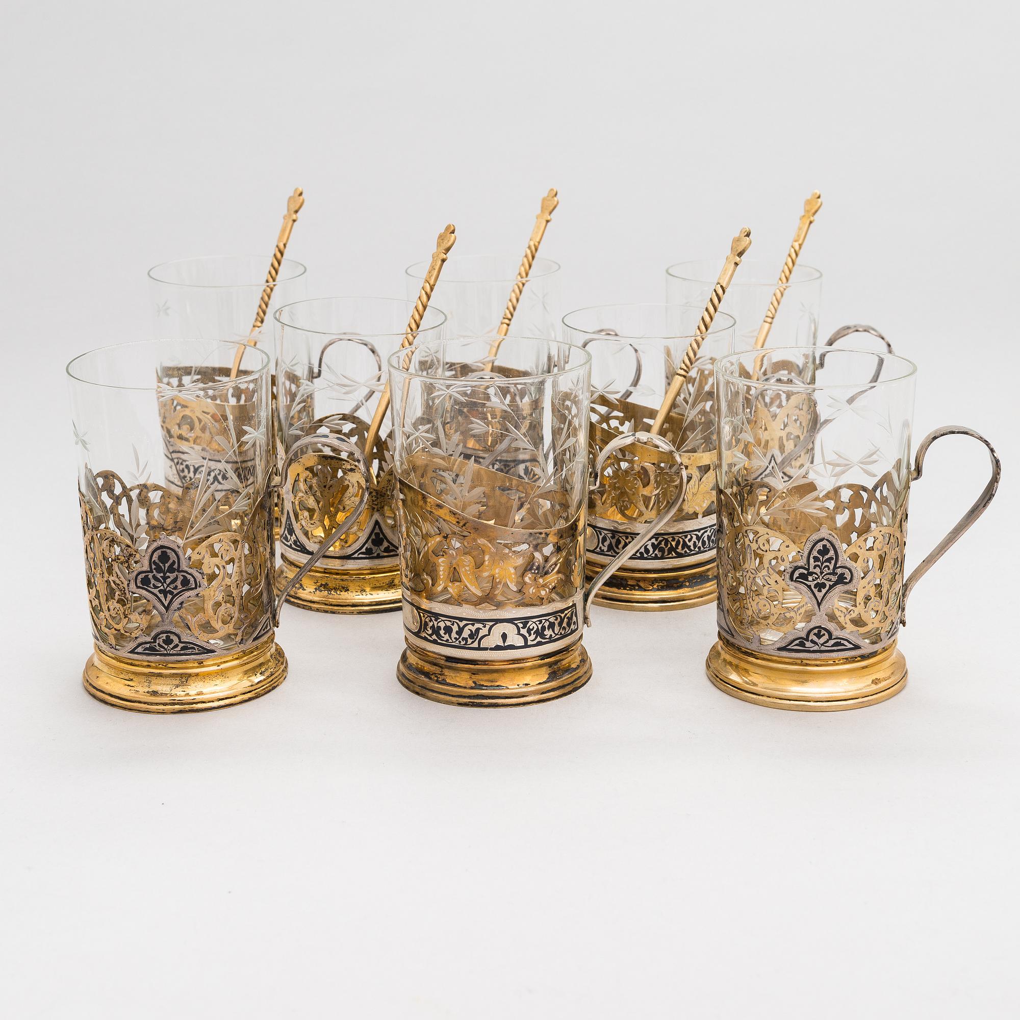 A set of eight Kubachi tea glass holders and five teaspoons, parcel-gilt silver, niello, Russia 1960s.