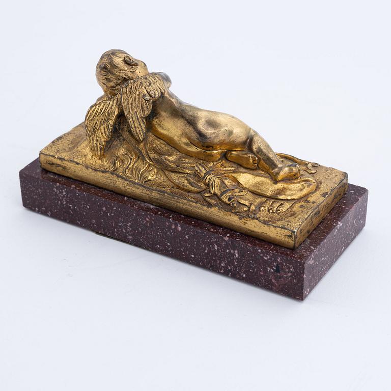 A porphyry and ormolu paperweight, possibly French, late 19th century.