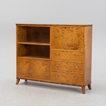 A birch and rosewood veneered bookcase, 1940's.