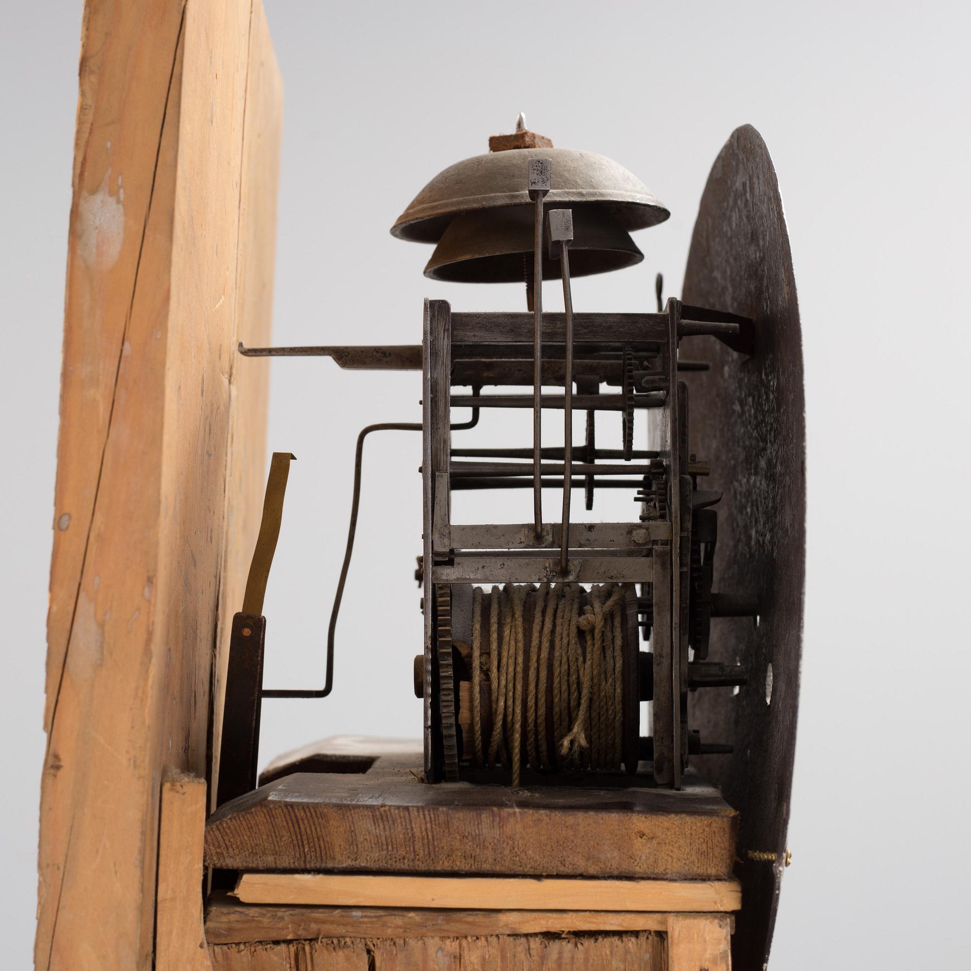 a painted grandfather-clock from the first half of the 19th century.