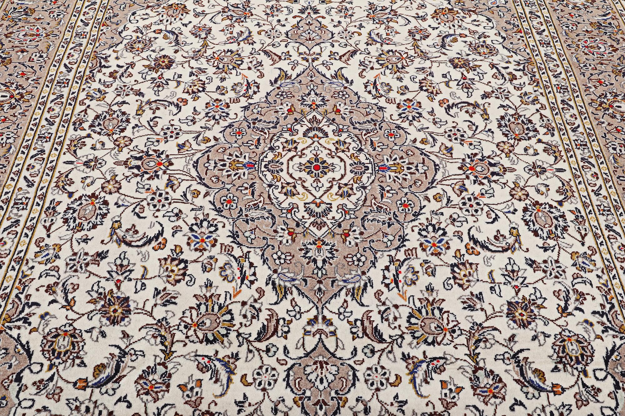 A Kashan carpet, c. 357 x 240 cm.