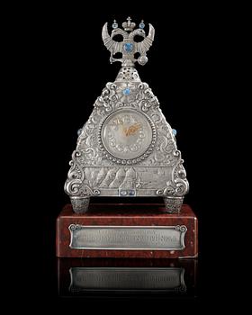 893. A RARE SILVER FABERGÉ CLOCK, Moscow 1908-1917. Imperial Warrant and scratched inventory no 17689.