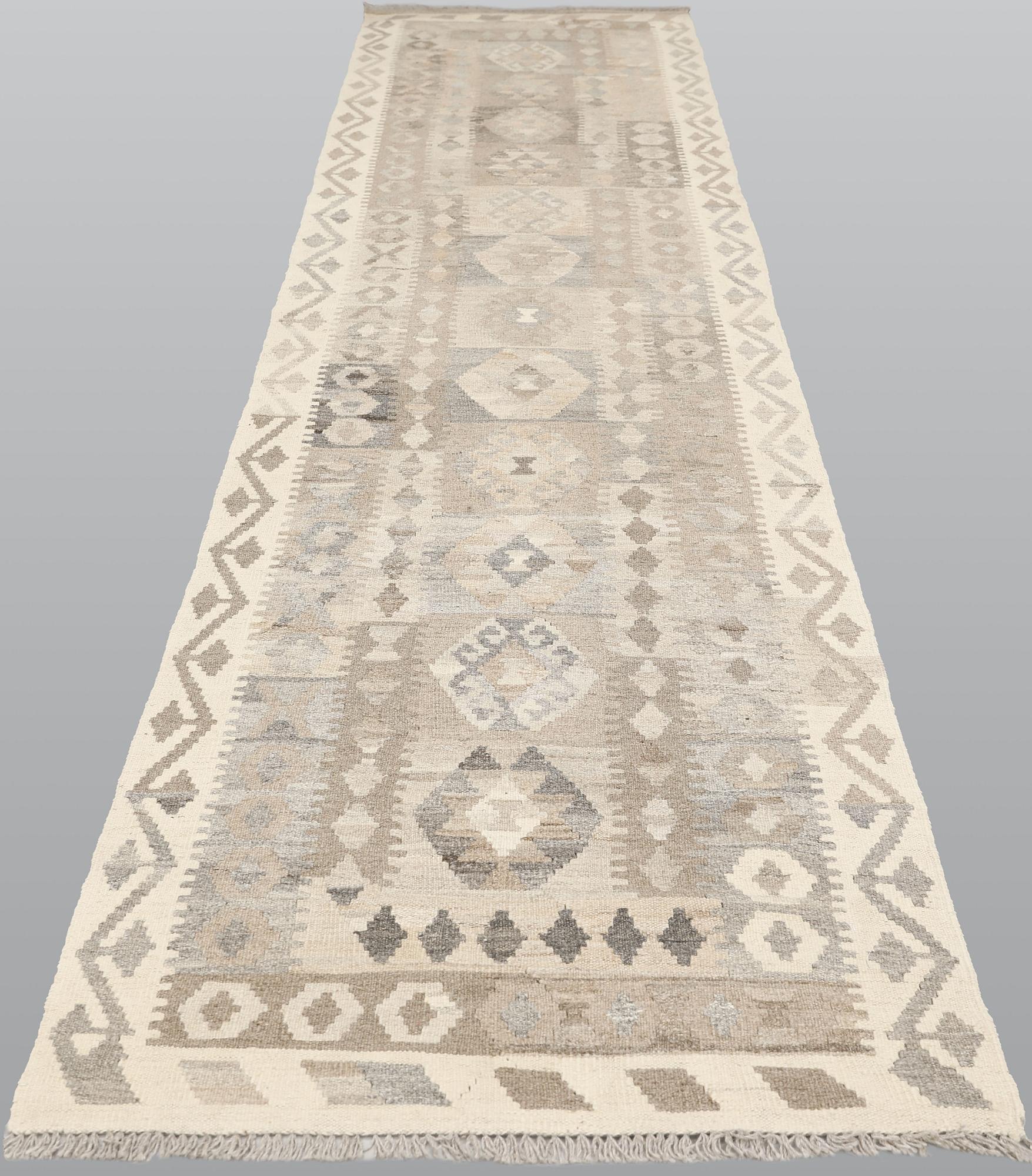 A Kilim runner, approx. 438 x 88 cm.